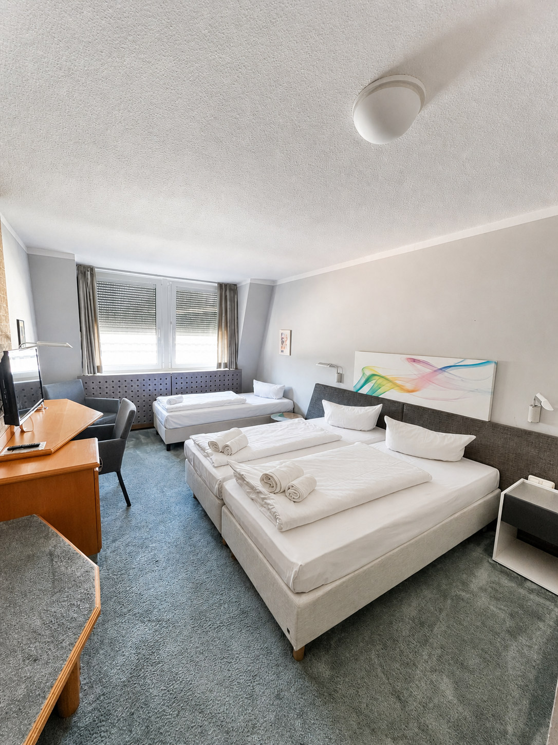 Geräumiges Dreibettzimmer im Hotel Lachnerhof